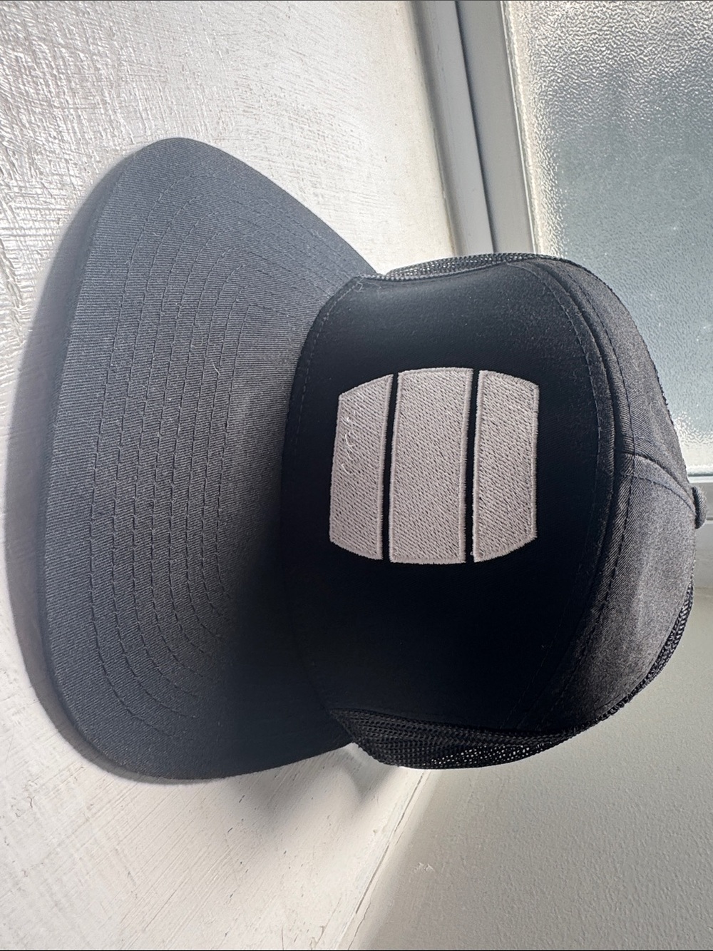 London Brewing Co-op Black Mesh Trucker Hat with Contrasting Front Patch